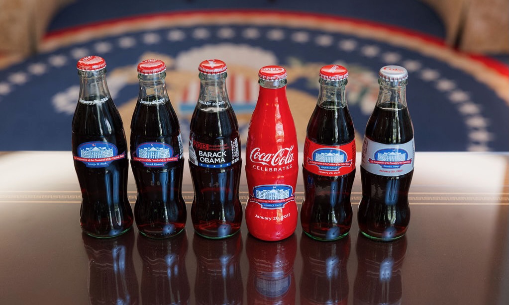 Line up of 6 different inauguration bottles