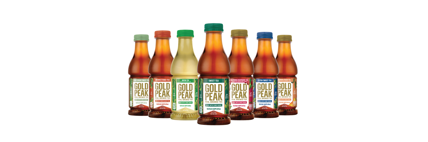 Seven differently colored and flavored bottles of Gold Peak